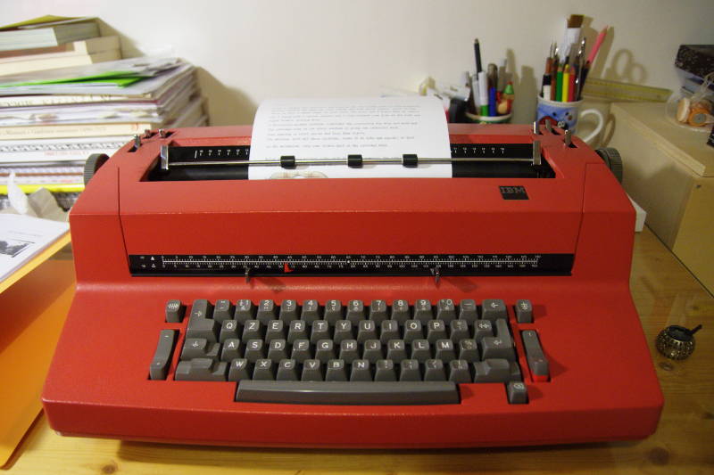 red IBM Selectric typewriter