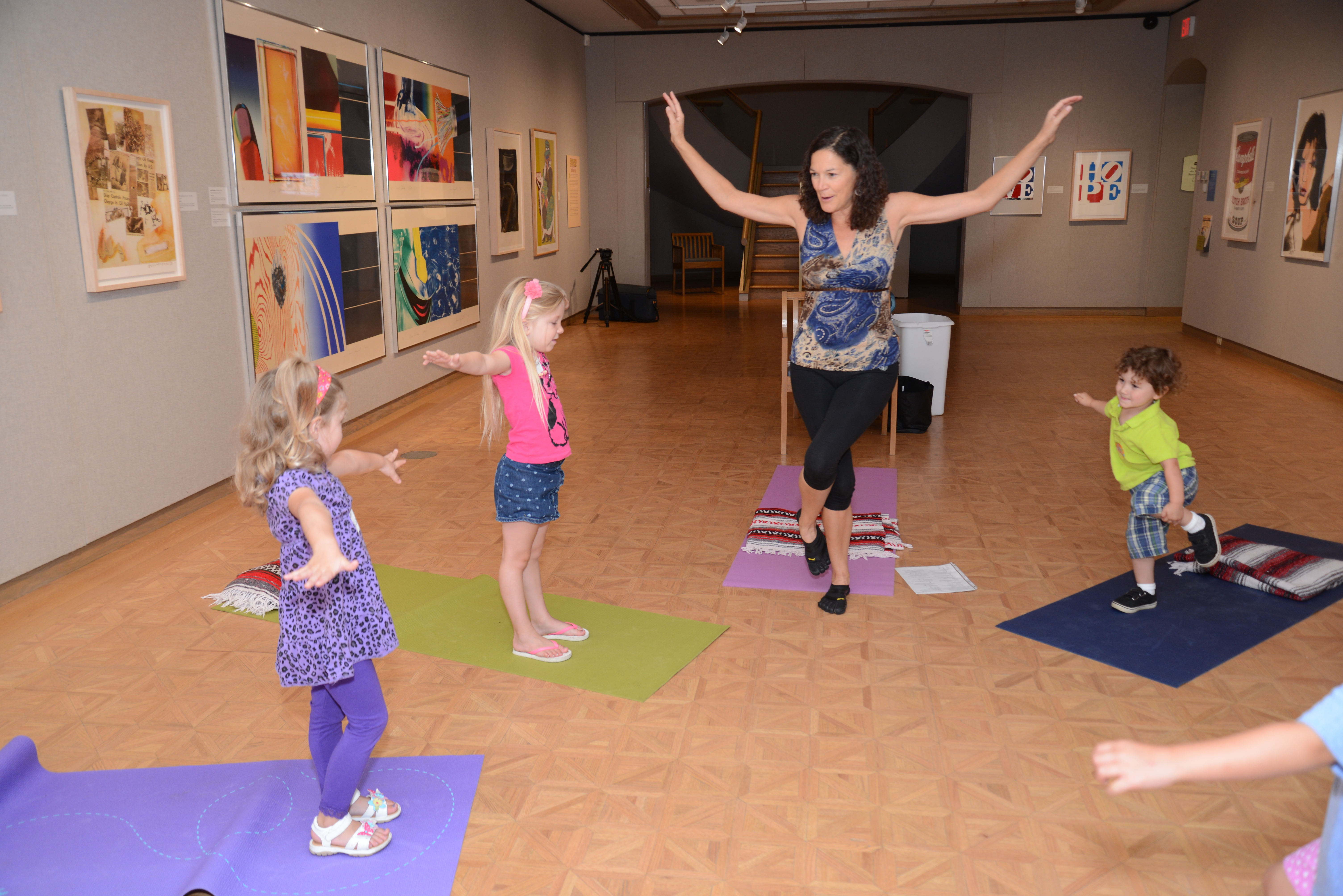 Mary Hilliker of River Flow Yoga leads family yoga sessions during Family Fest.