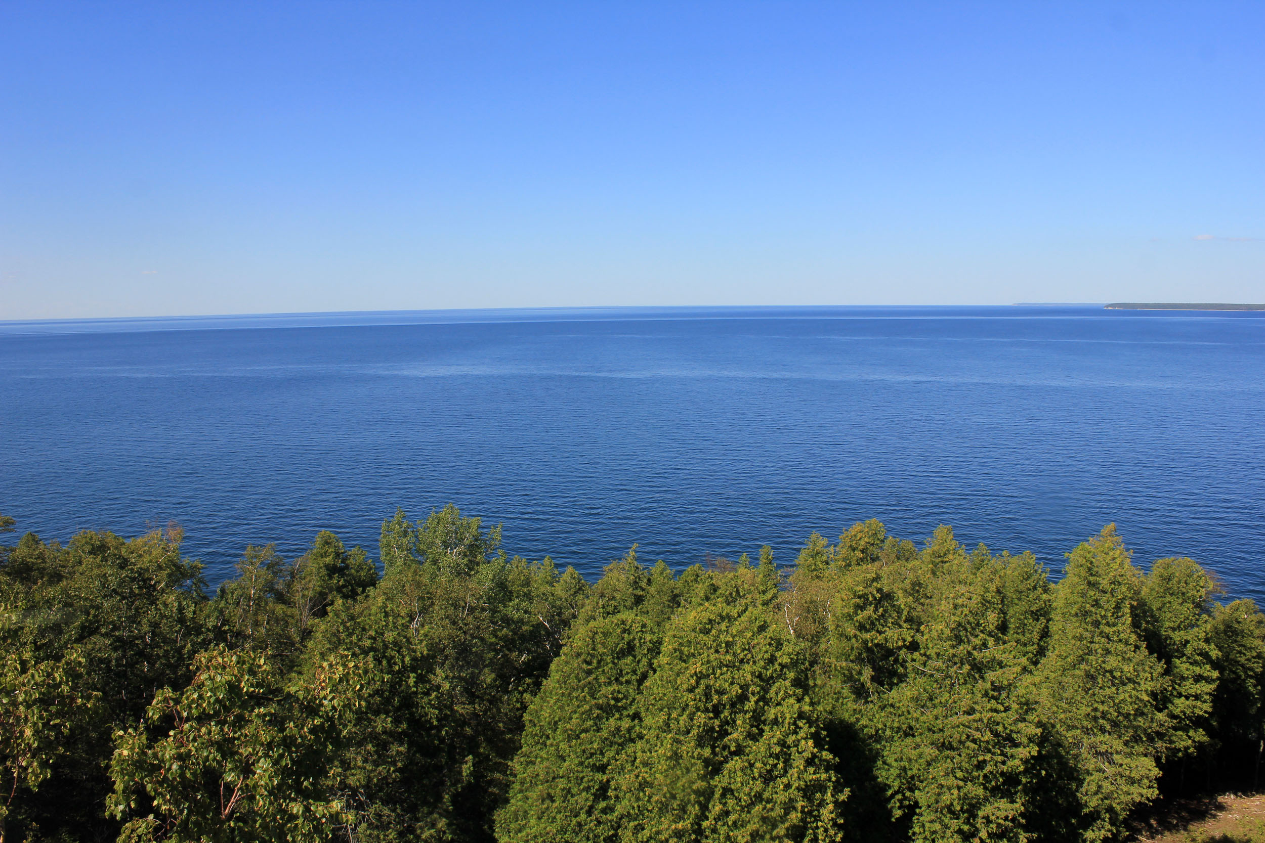 Photo of the bay of Green Bay with St. Martin's Island, Michigan in the background