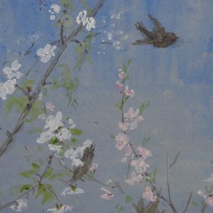 Three birds among blossoms with a blue sky.