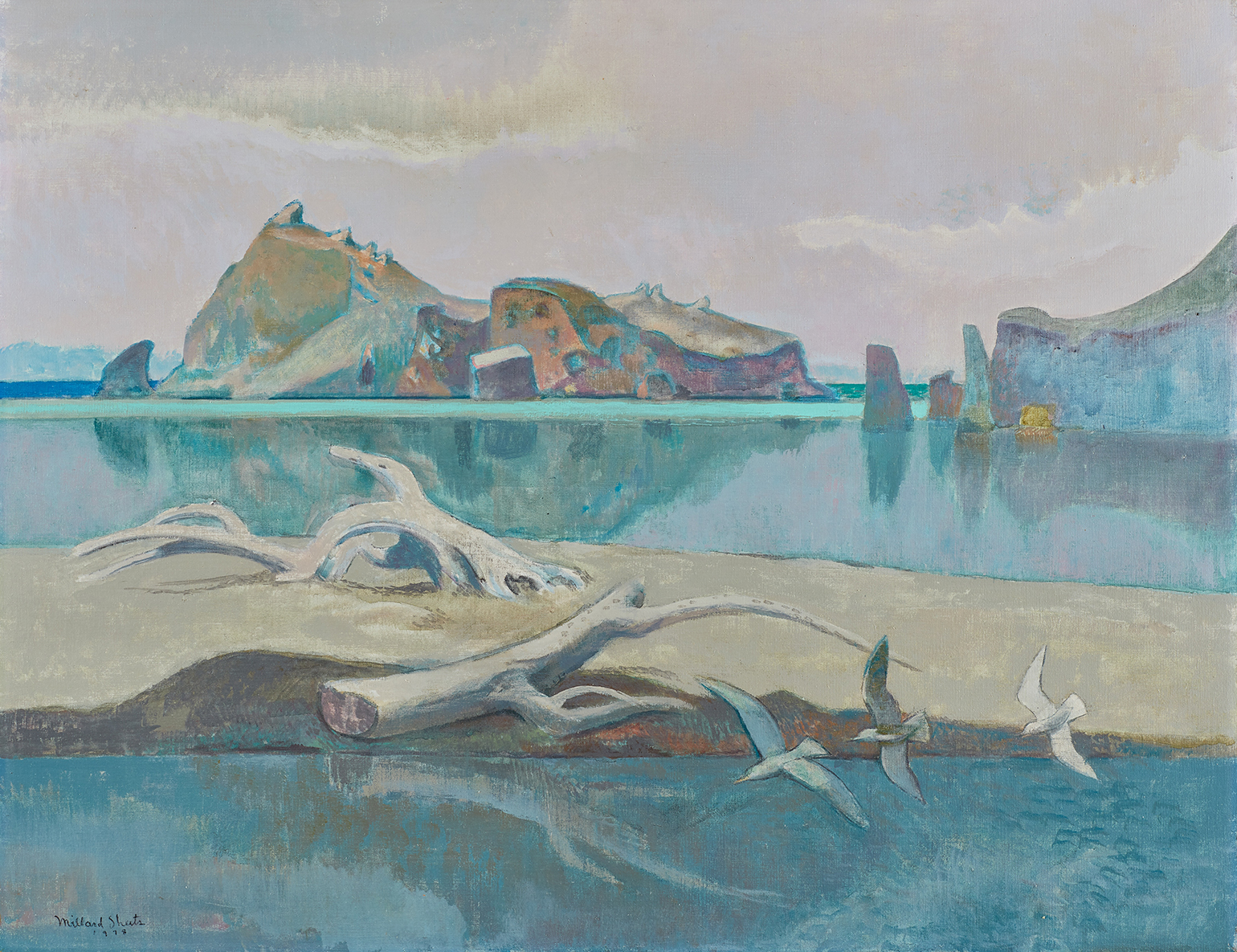 Three white birds fly in the foreground above turquoise water and several islands in the background