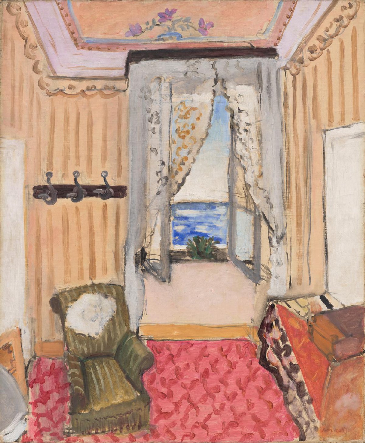 A painting shows half of a room with an armchair, decorated ceiling, and open window with white drapes and a view of the sea.