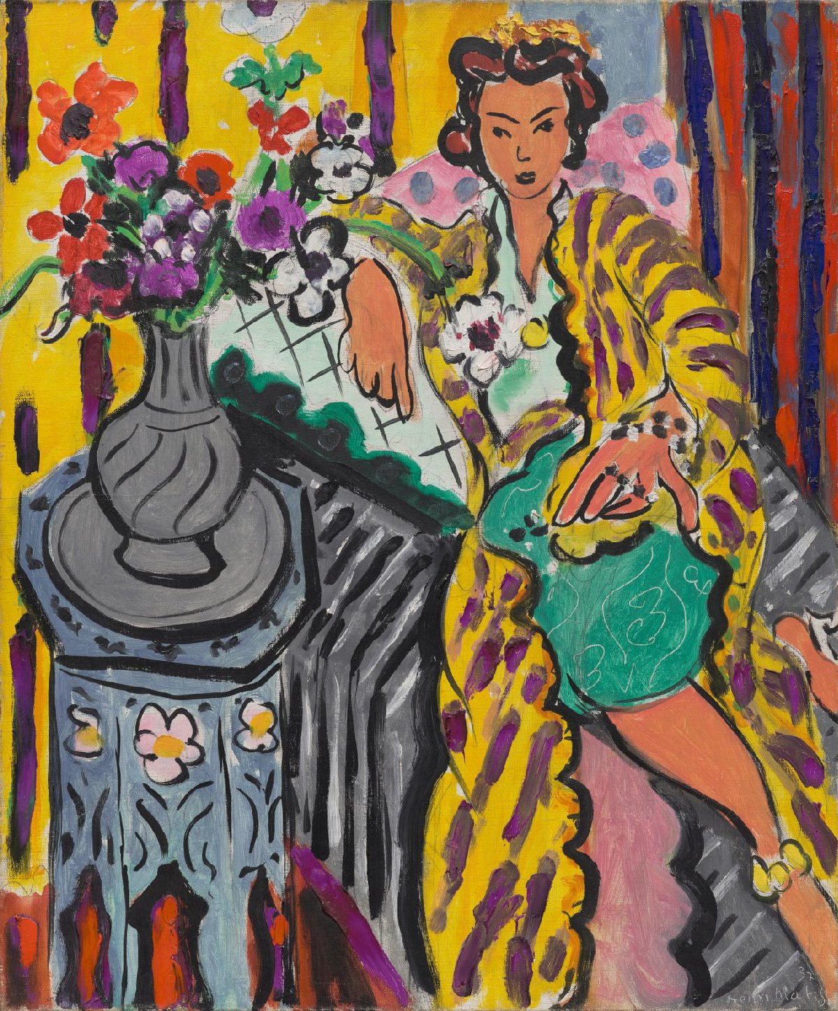 A painting shows a woman in a yellow and purple striped robe with green knee-high pants sitting in a pink armchair. A vase of flowers sits nearby.