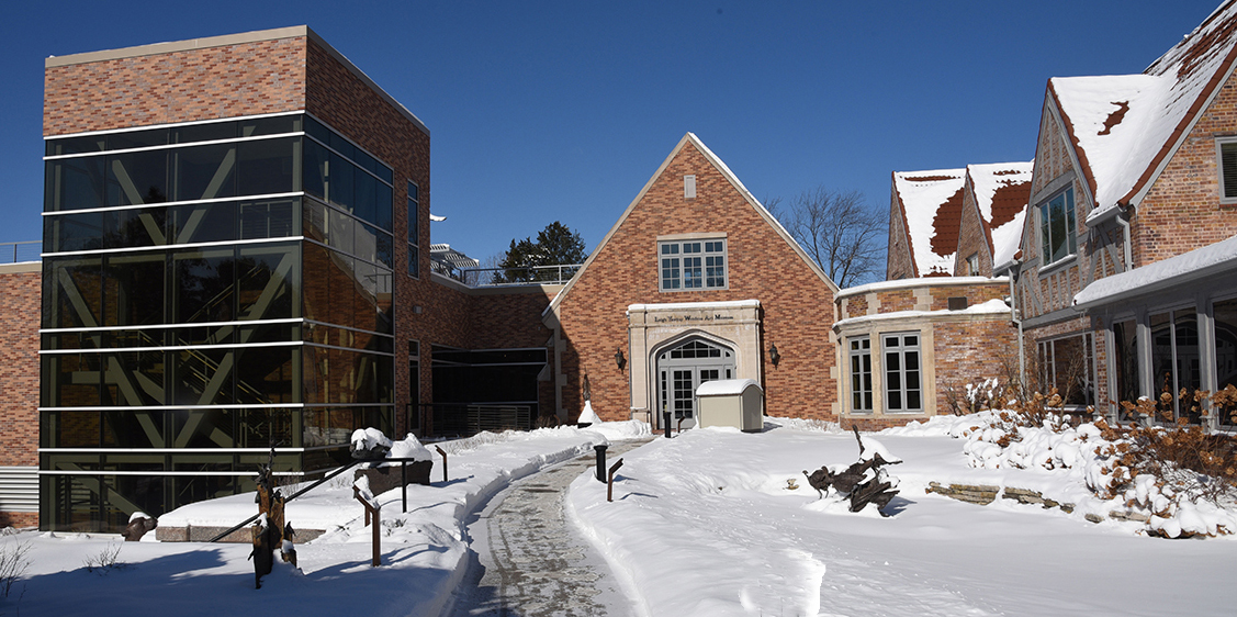 Snowy exterior view of the Woodson Art Museum
