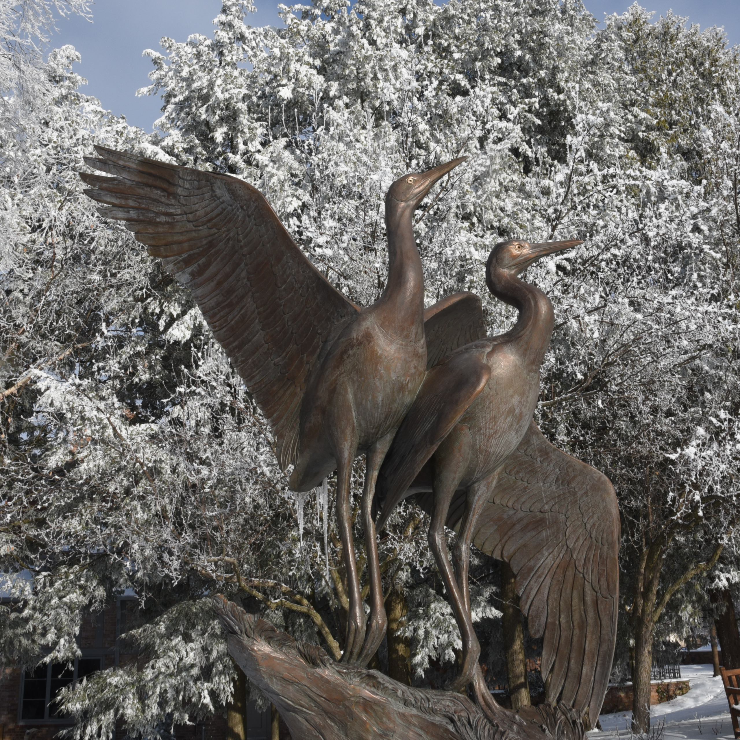 bird sculpture in winter frost