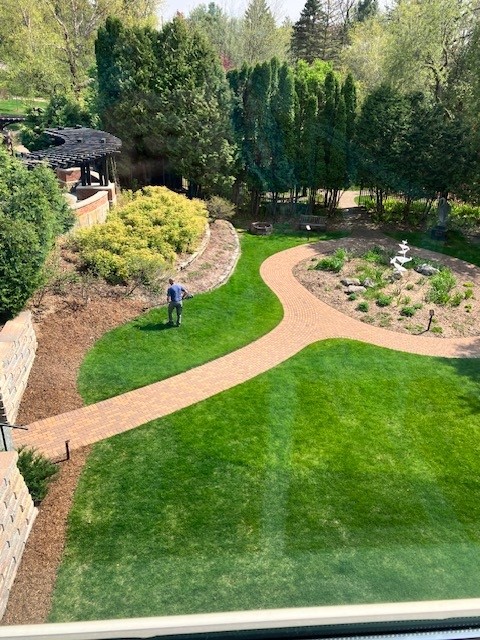 This photo shows Don Bradford, taking care of the Museum's lawn