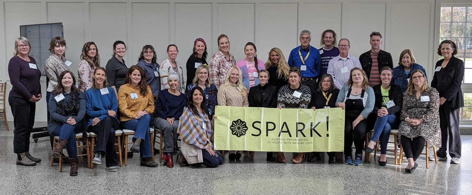 Community educators from museums and outreach organizations posing for a group photo at the end of the conference.