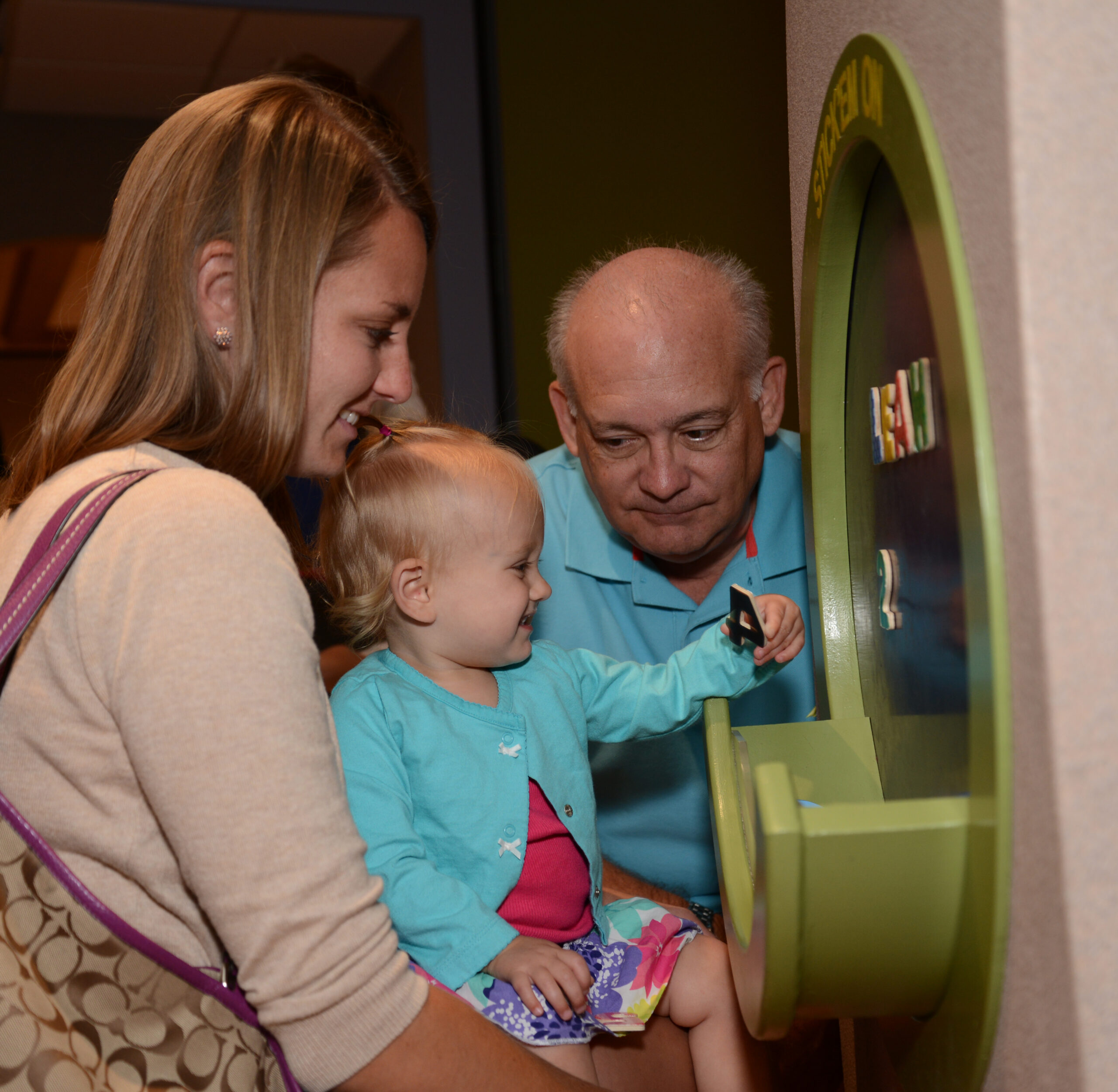 Three generations play in Art Park during Family Fest